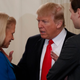 Noted coward and President of the United States Donald Trump talks with noted invertebrate and IBM CEO Ginny Rometty as noted violator of nepotism laws and overall toad Jared Kushner looks on during a meeting on February 3, 2017 (AP Photo/Evan Vucci)